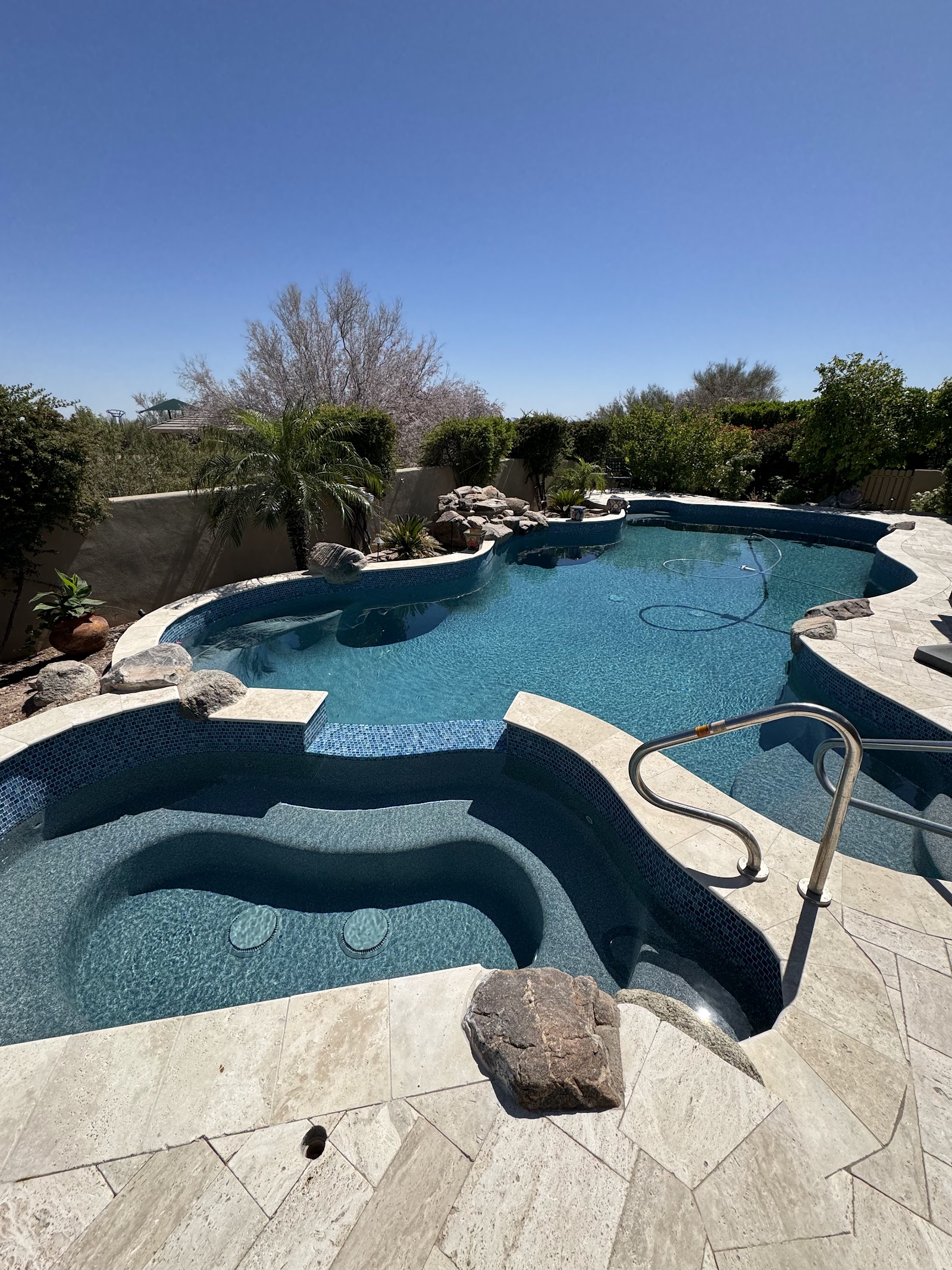 Modern Desert Pool with Travertine Deck